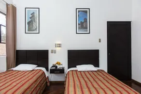 Hostal & Apartments El Triunfo - Room