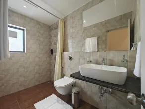 Hotel Shivam by Greenwoods Resorts - Salle de bain