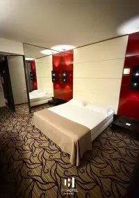Iris Hotel - Habitación