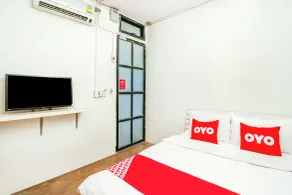 OYO 1191 Happy Motel - Quarto