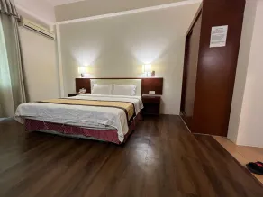 Hotel O Atari Inn - Zimmer