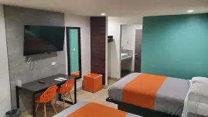 Exclusivo Inn and Suites - Chambre