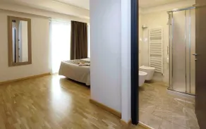 Dama Hotel - Zimmer