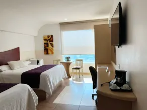 Hotel Magico Inn - Zimmer