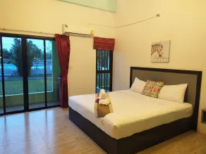 RoomQuest Chonburi Phanat Nikhom - Quarto