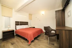 Capital O Hotel Boutique Las Torres - Camera