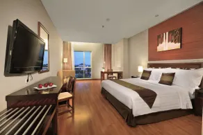 Aston Tanjung City Hotel - Chambre