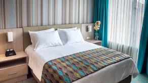 Hotel Plaza Suites - Chambre