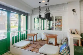 Ratana Boutique Hostel - Coin salon dans le hall
