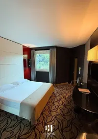Iris Hotel - Habitación