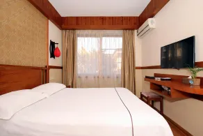 Guilin Gunanmen Hotel - Zimmer