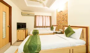Treebo Premium Paradise - Chambre