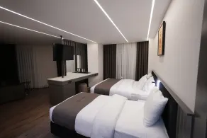 The Nava Hotel - Zimmer