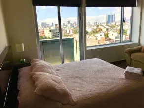 Napoles Condo Suites - Vista do quarto