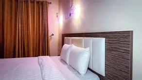 Mo-House Hotels and Events Centre - Room