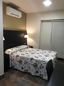 Hostal Restaurante La Bartola - Chambre