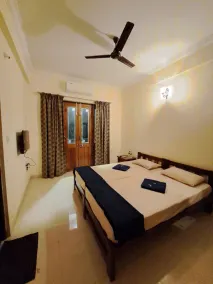 D'souza's Guest House - Zimmer