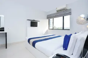 Townhouse Malabar Illam Kochi - Habitación