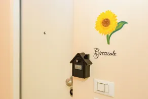 Flowers Apartments - Entrada interior