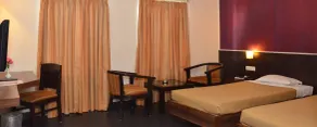 Abirami Residency - Chambre