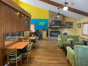 America's Stay Inn Stewartville - Coin salon dans le hall