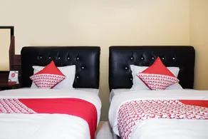 Super OYO 598 Udan Mas Guesthouse& Gallery - Habitación