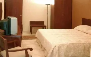 Golden Carven Hotel - Habitación