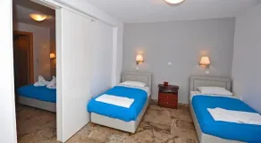 Triton Hotel & Bungalows - Room