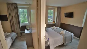 LOGIS HOTEL L'HÔTEL DES BAINS - Salles-la-Source - Zimmer