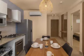 Surfside Beachfront Suites by Playa Caracol Resorts - Room