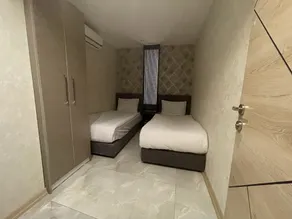 Le Luxe Suites Hotel - Habitación