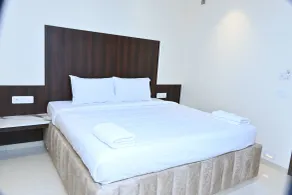 Grand Manor Suites - Chambre