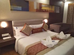 Hotel Mansha Regency - Chambre