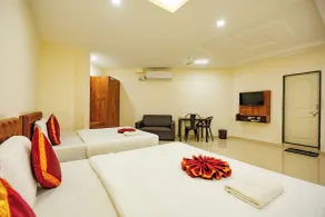 Hotel Rajdhani Inn & Suites - Quarto