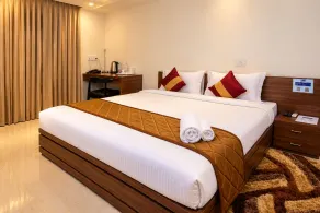 The Altruist Koparkhairane Hotel - Quarto