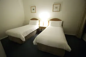 Carlyle Suites & Apartments - Room