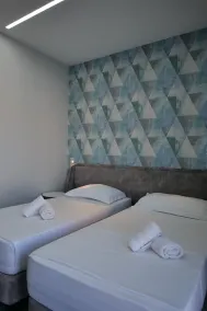 The Blue Wave Hotel - Zimmer