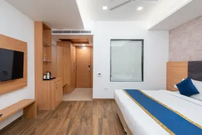 The sandalwood by Manvenco Hospitality - Room