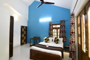 OYO 9741 Triple Beach Guest House - Chambre