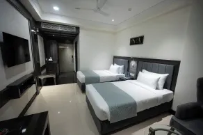 The Mudra Hotel - Quarto
