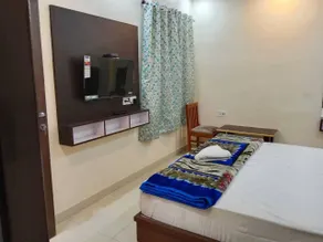LS Grand Guest House - Chambre