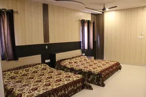Hotel Gokul inn - Quarto