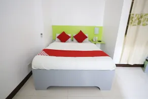 OYO 210 Apple Tree Suites - Chambre