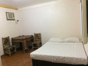 RedDoorz Hostel at Megans Paradisio Beach Resort - Zimmer