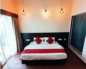 Holiday Courtyard Wayanad - Quarto