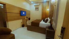 OLYMPUS HOTEL & SUITES - Zimmer