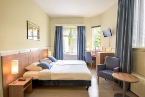 Hotel et le Cafe de Paris - Quarto