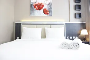 Convenient 1BR Gateway Pasteur Apartment By Travelio - Zimmer