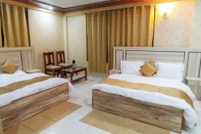 Hotel SNR Grand - Zimmer