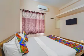 Fabhotel Praneeth Residency - Habitación